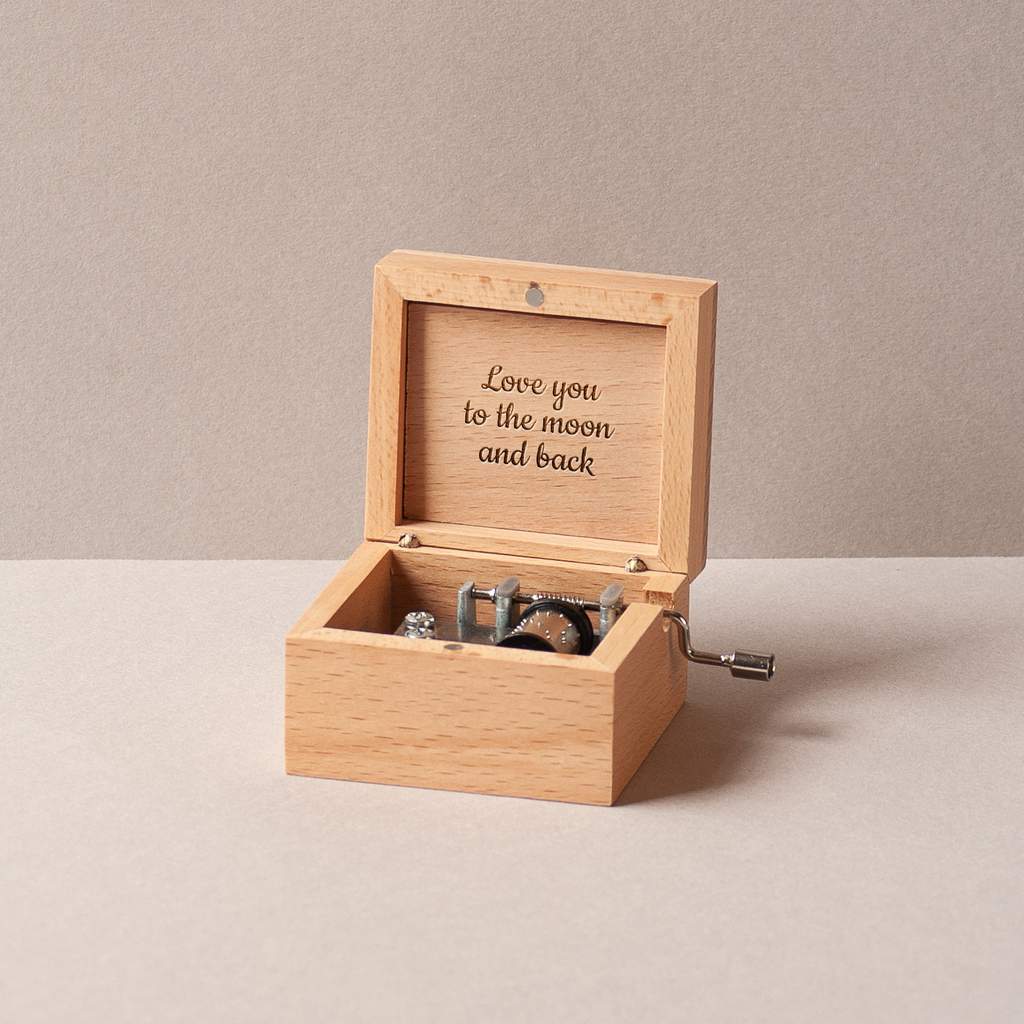 Music box with your initials, date and a sun